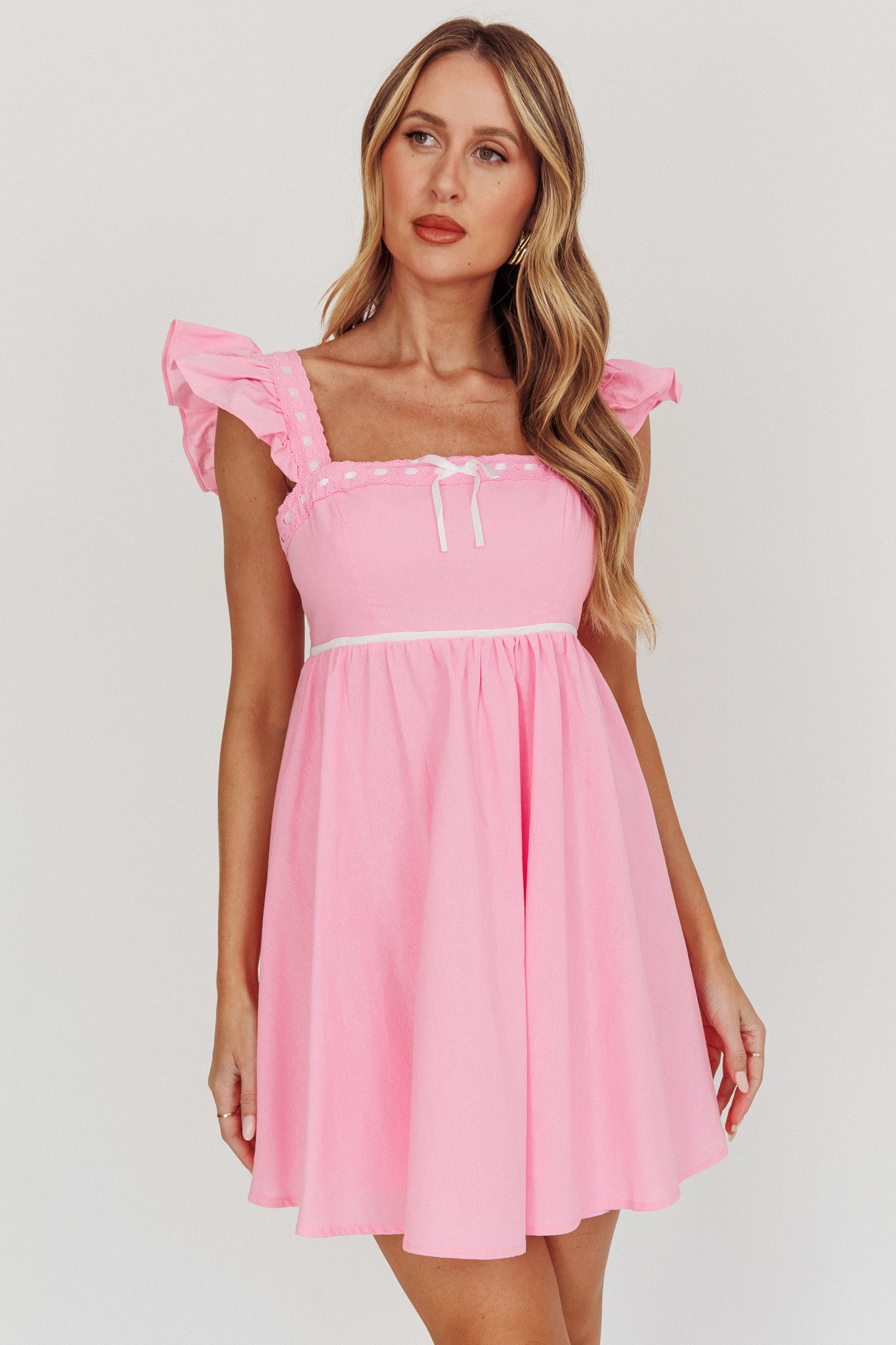 light pink babydoll dress Heartfelt Simply add heels and a sparkly clutch Sugar Thrillz Satin Bow Ruffle