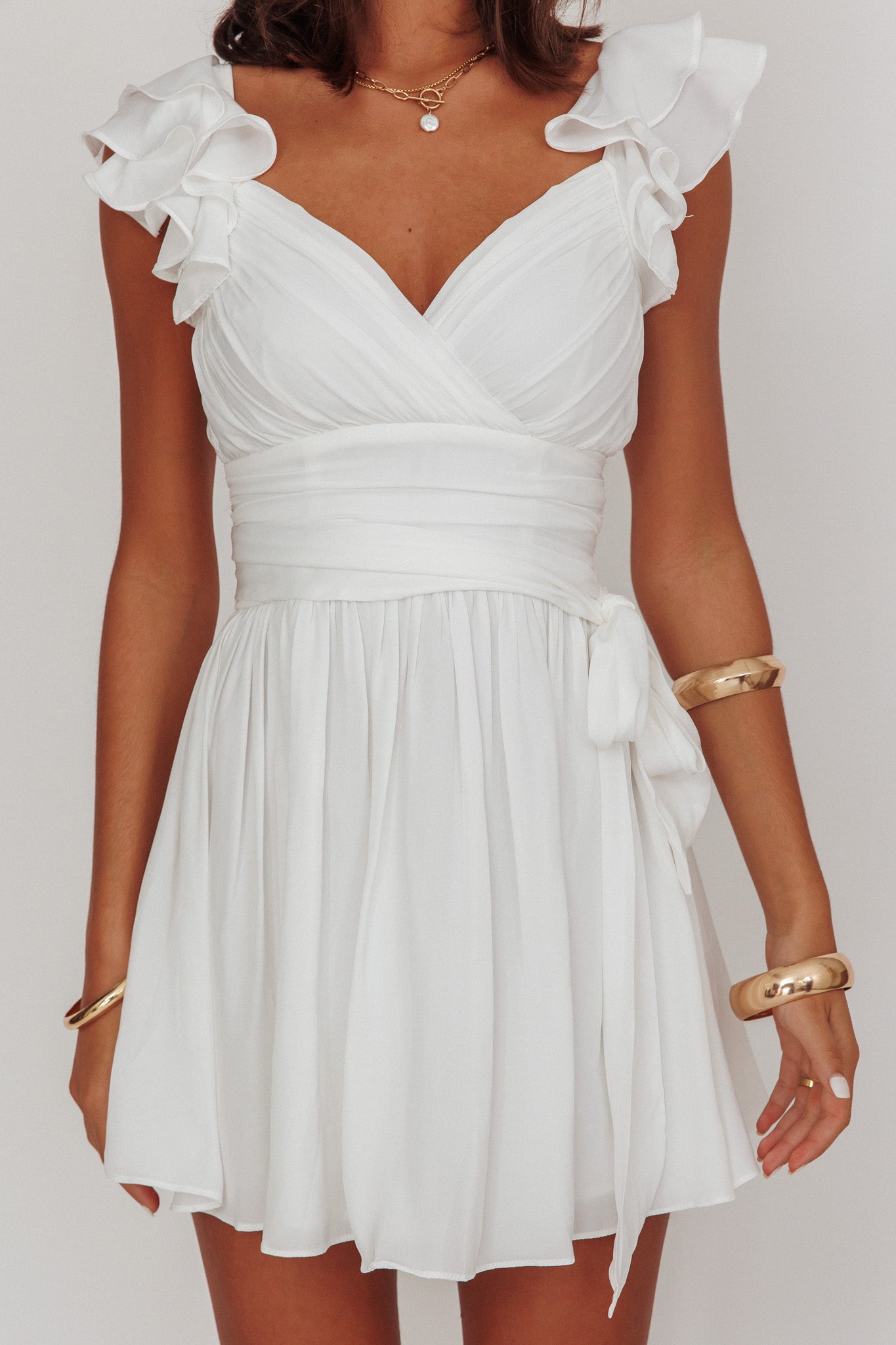 lola ruffle shoulder ruched dress textured white white ruffle dress mini Lola Ruffle Shoulder Ruched Dress Textured White