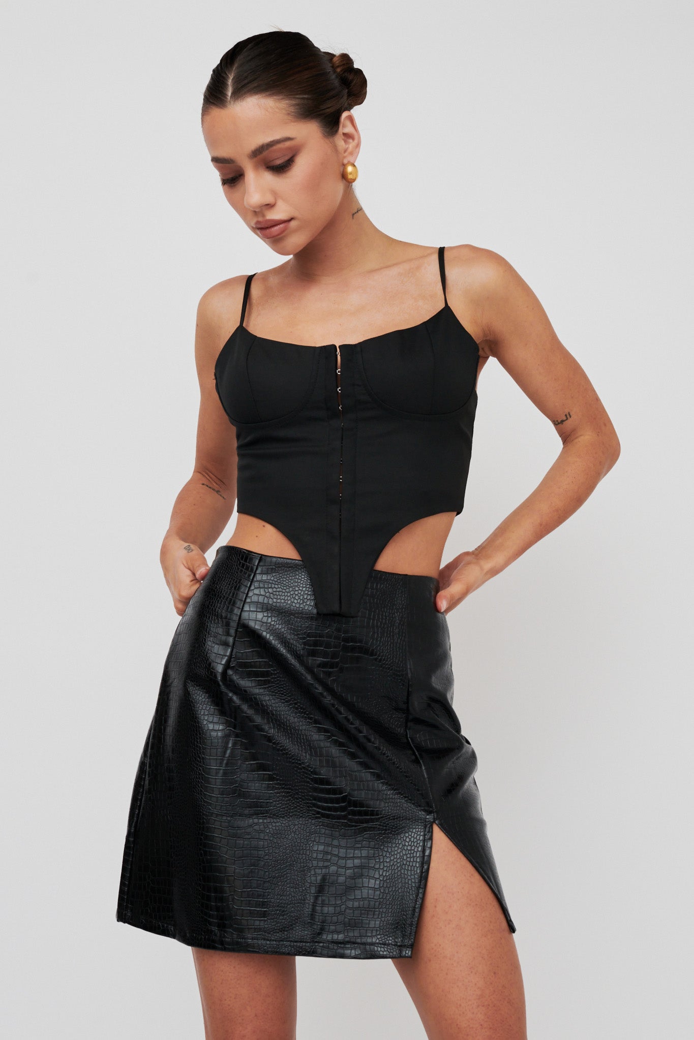 Darwin Embossed Mini Skirt Black by Selfie Leslie