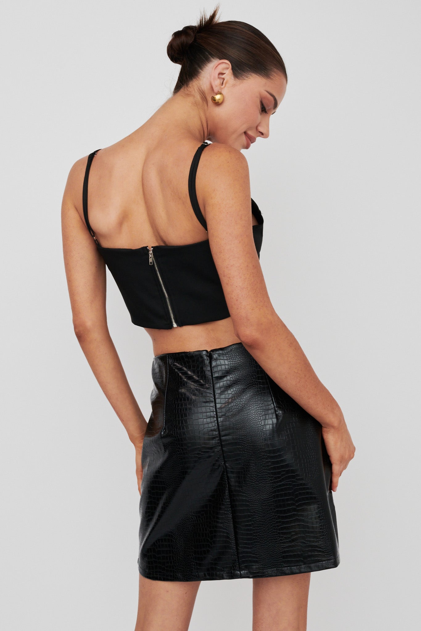 Darwin Embossed Mini Skirt Black by Selfie Leslie