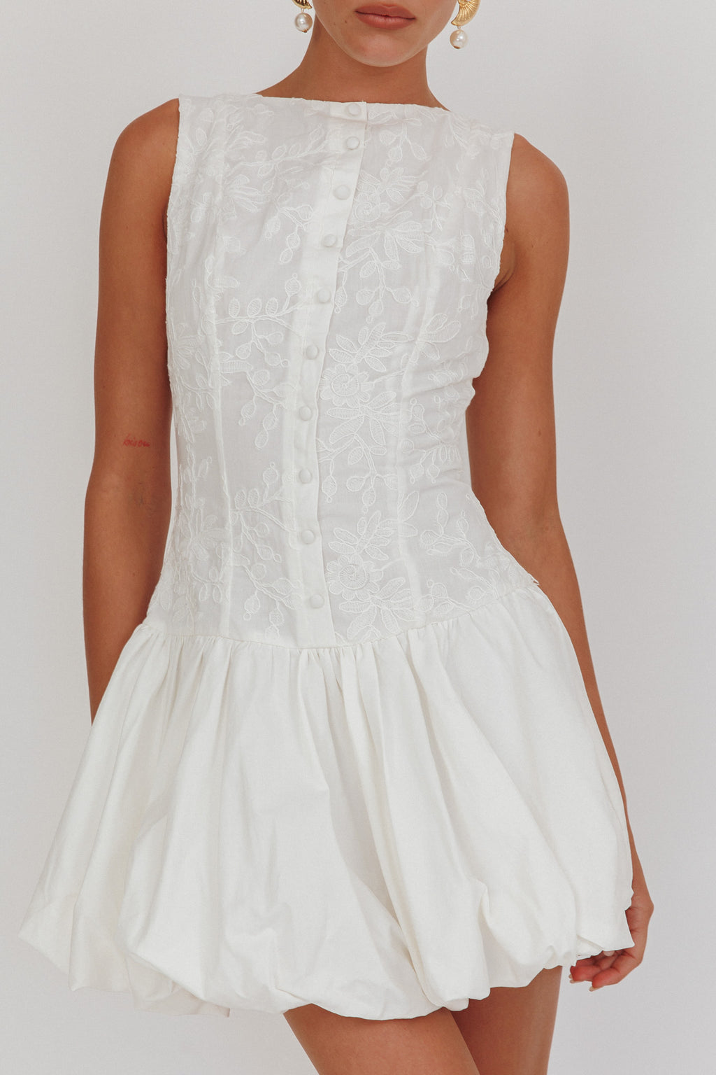Opulent Sleeveless Bubble Hem Mini Dress Embroidered White by Selfie Leslie