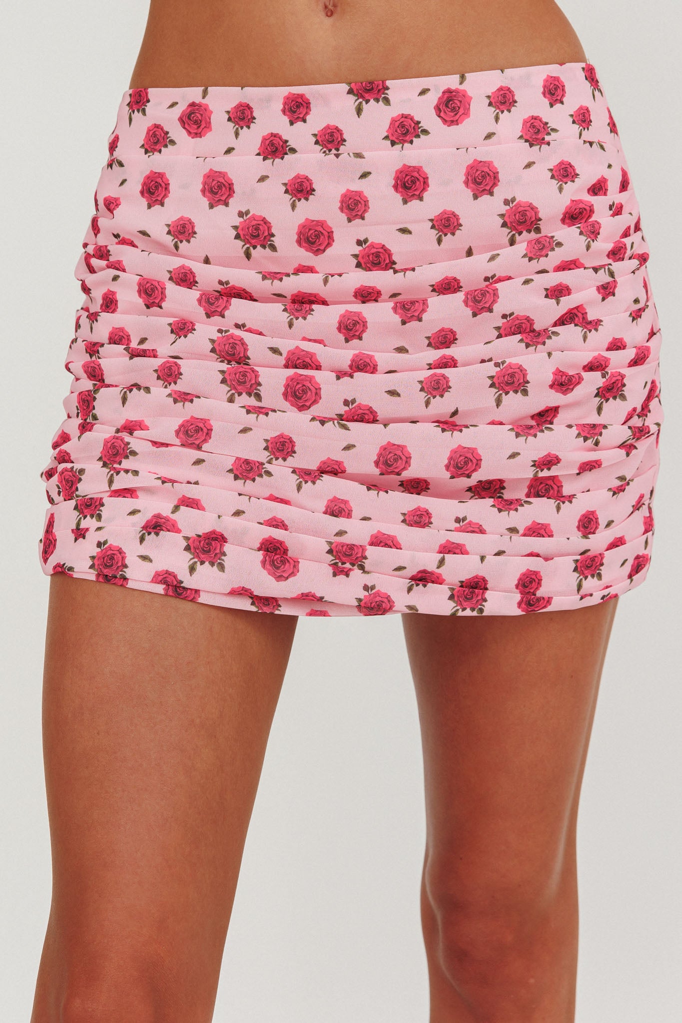 Charise Ruched Mini Skirt Roses Pink by Selfie Leslie