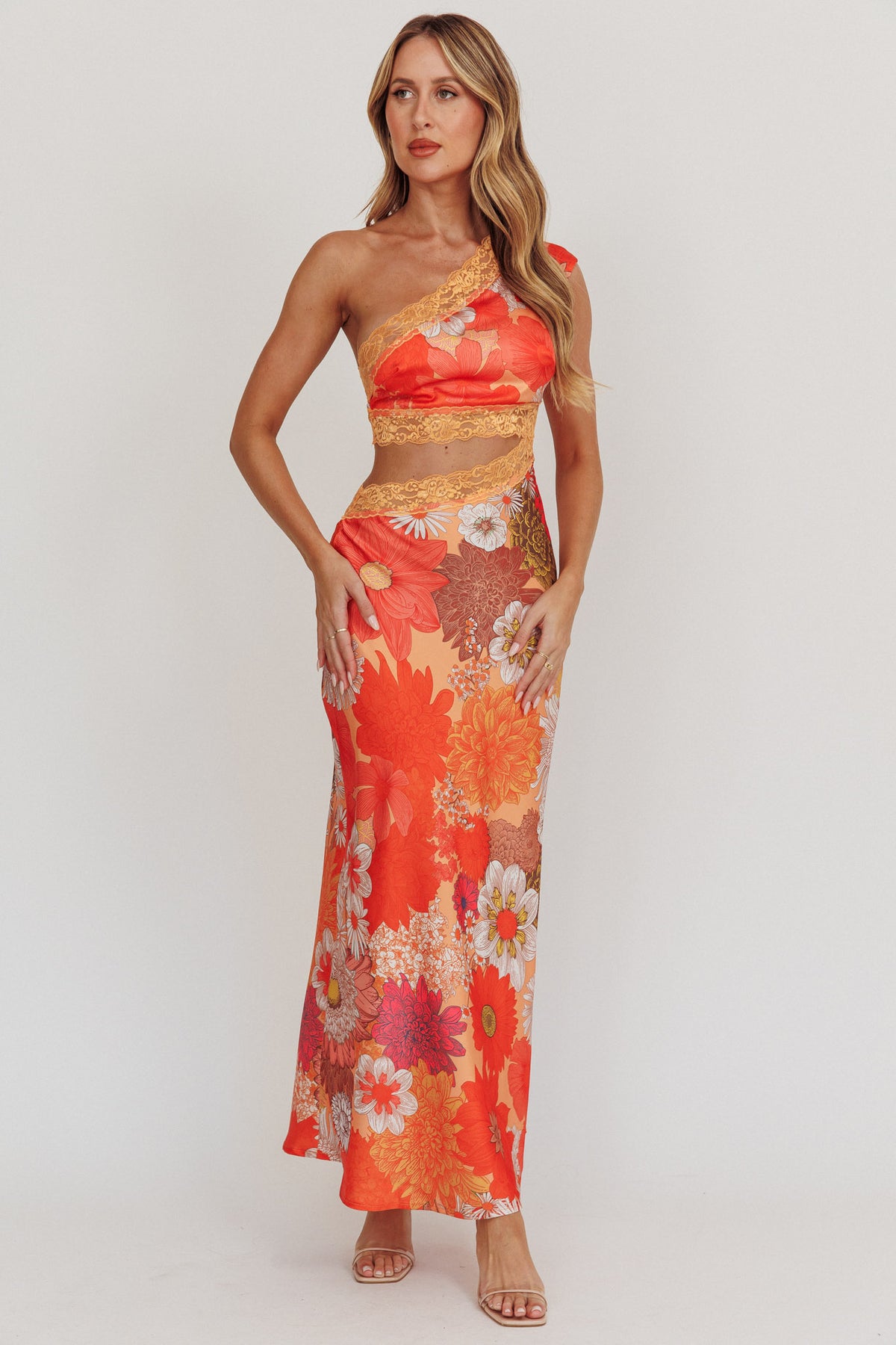 floral maxi dress with cutouts Mahli One-Shoulder Cut-Out Color:Orange/Tan Stripe Baserange Bella Dress in catching cutouts. Montana