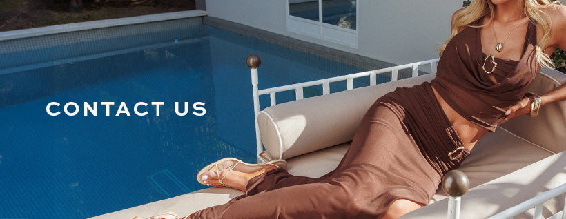 Woman lounging by a pool with 'Contact Us' text overlay