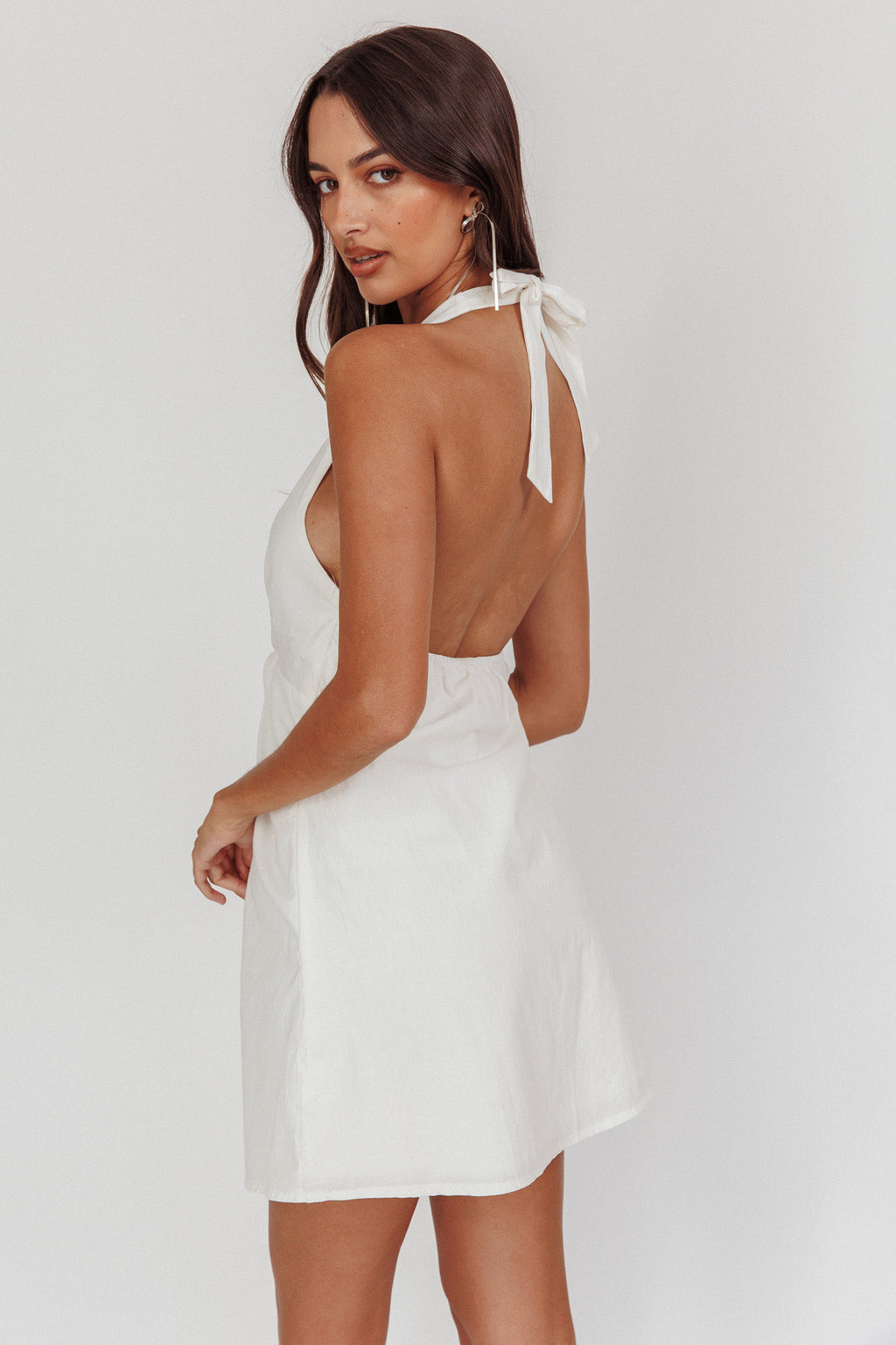 Zoriah Twist Bust Halterneck Mini Dress White by Selfie Leslie