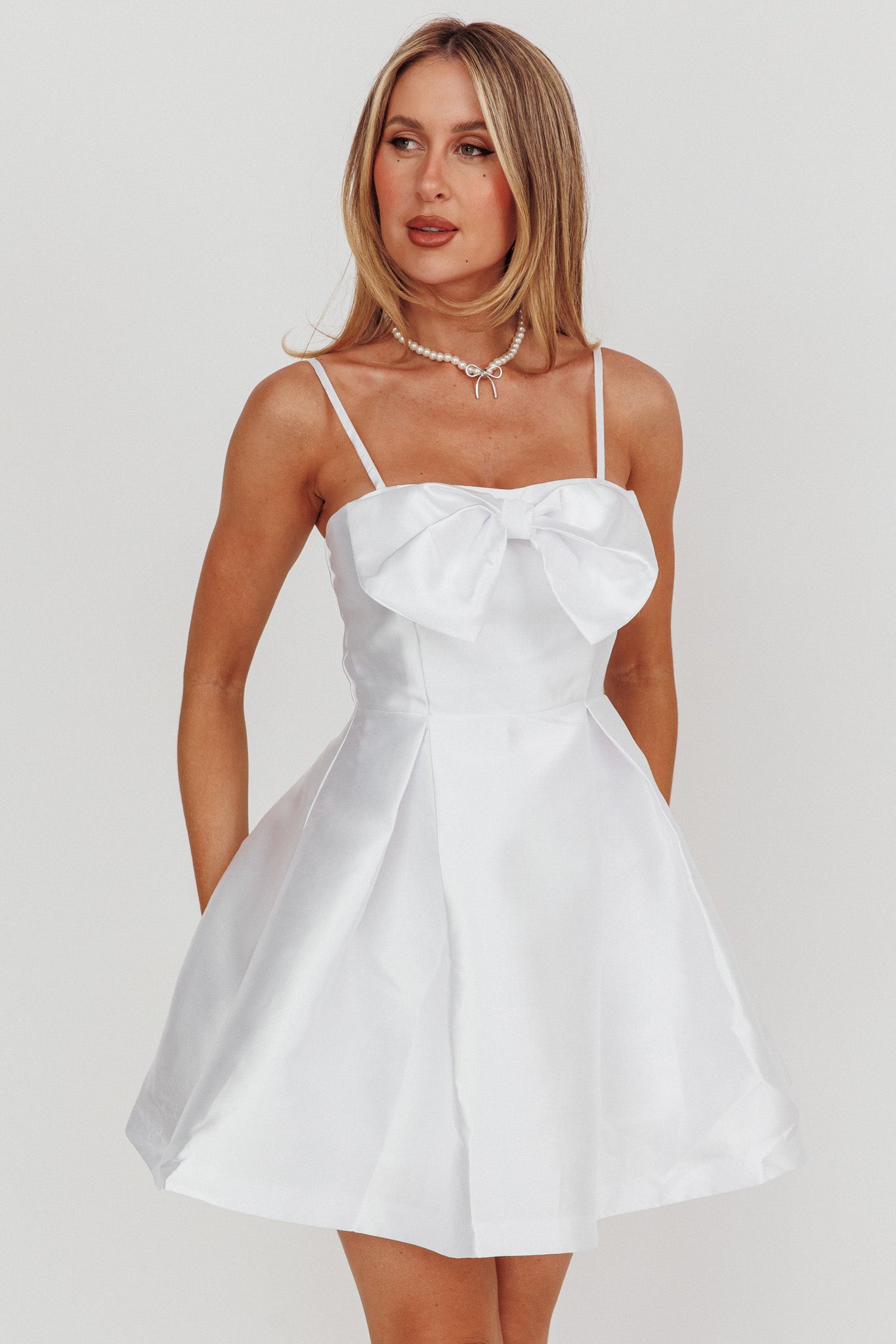 Love Talk Flared Bow Mini Dress White by Selfie Leslie