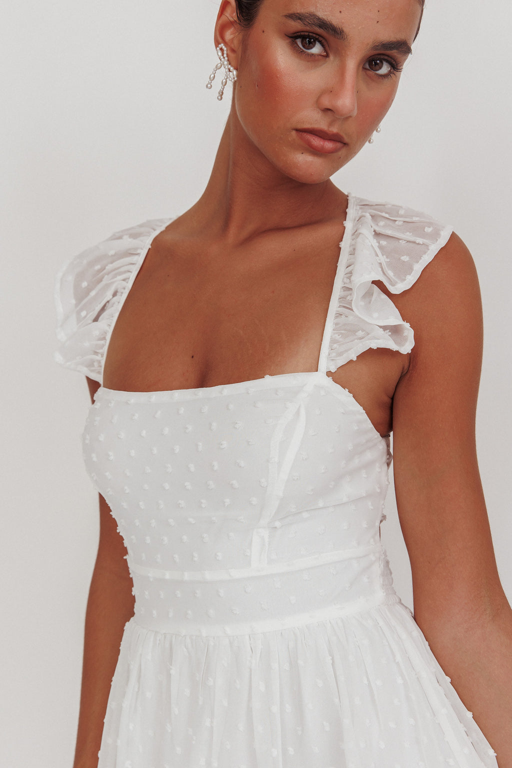 Franki Strappy Back Mini Dress Hail Spot White by Selfie Leslie