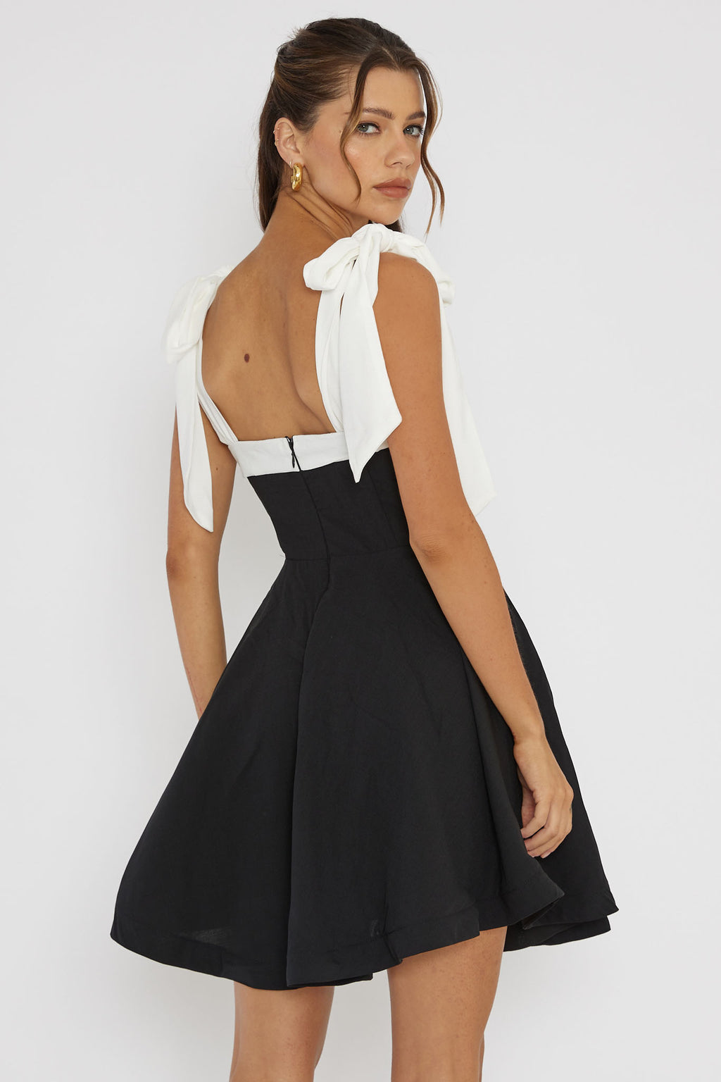 Jeanie Bow Shoulder Mini Dress Black by Selfie Leslie