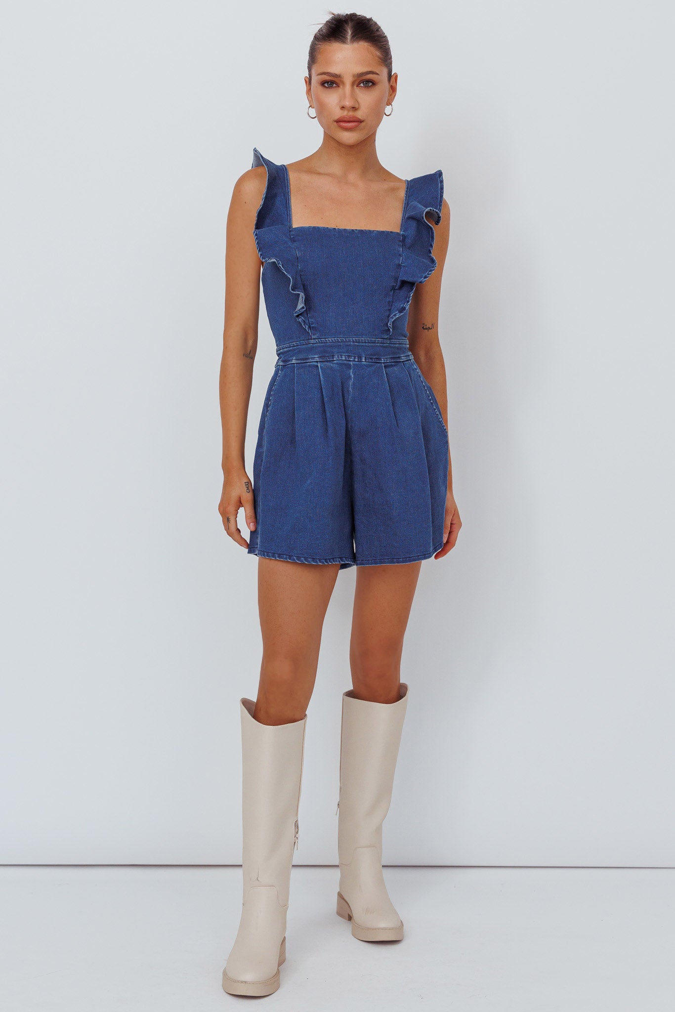 Nola Flared Ruffle Romper Light Denim by Selfie Leslie
