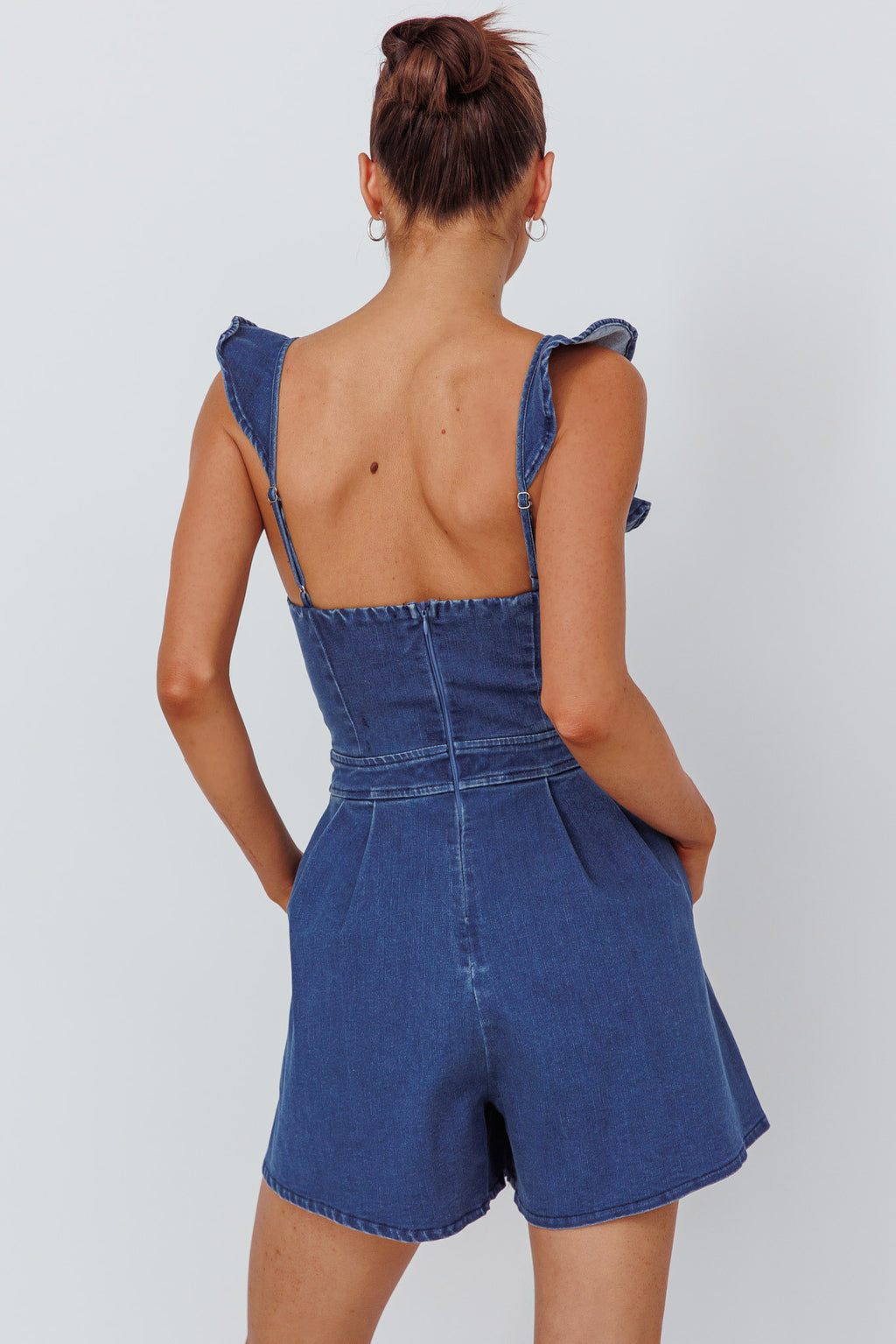 Nola Flared Ruffle Romper Light Denim by Selfie Leslie