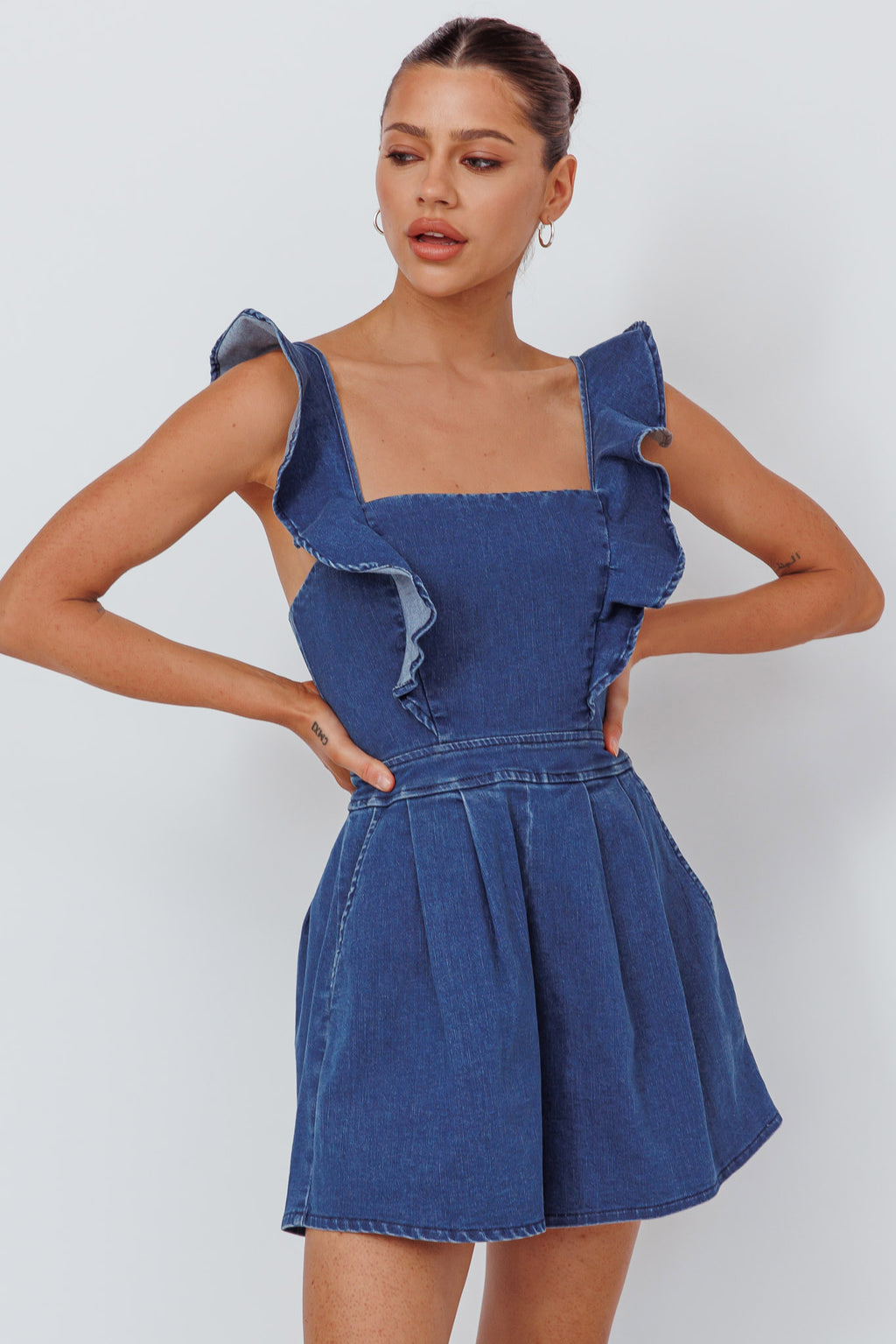 Nola Flared Ruffle Romper Light Denim by Selfie Leslie