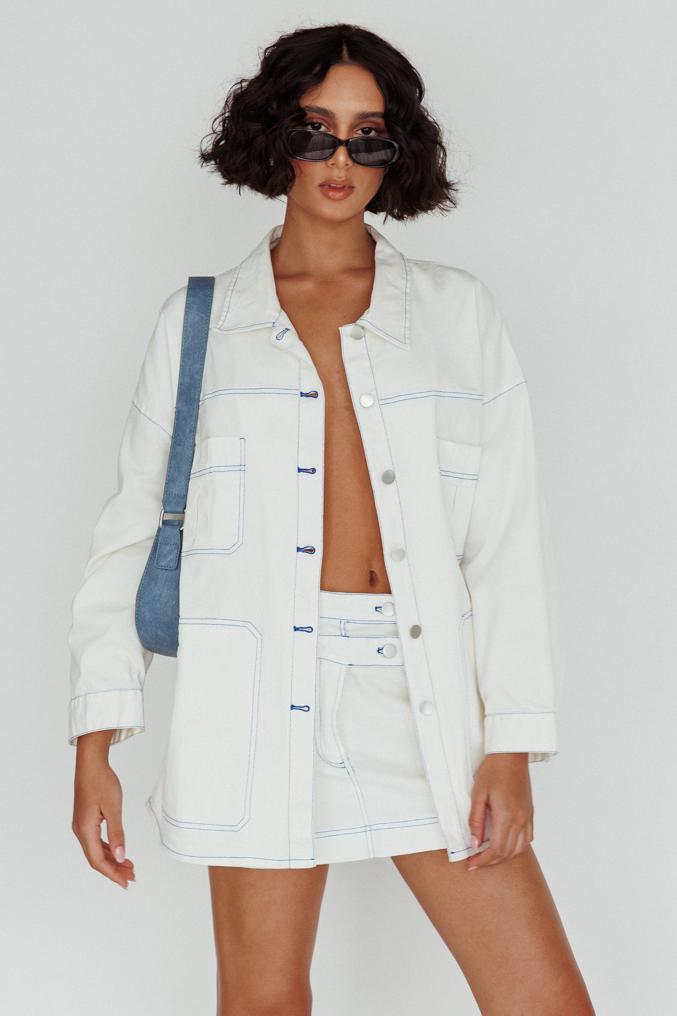 With The Band Accent Stitch Mini Skirt White by Selfie Leslie