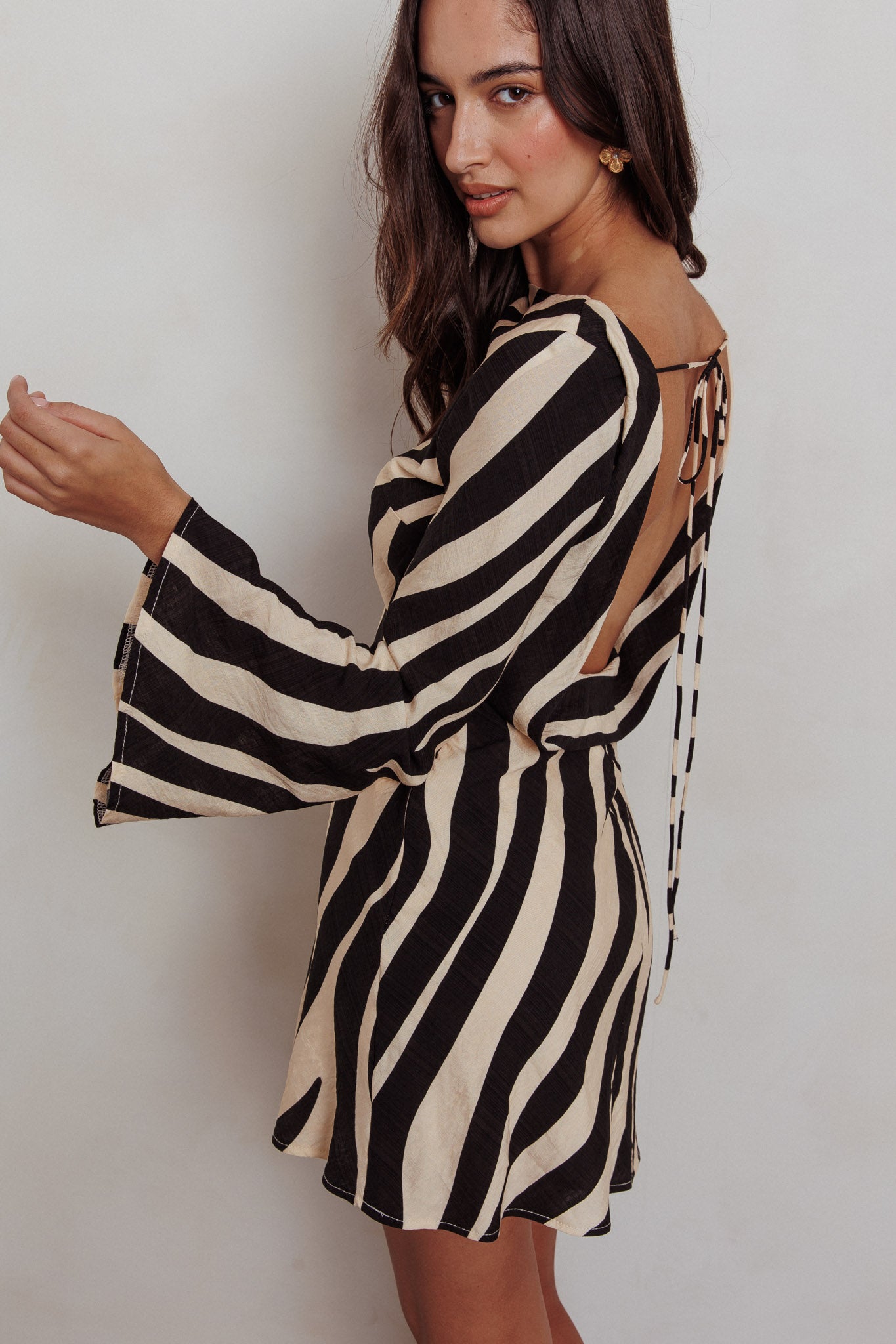 Shop the Thriller Long Sleeve Backless Mini Dress Zebra