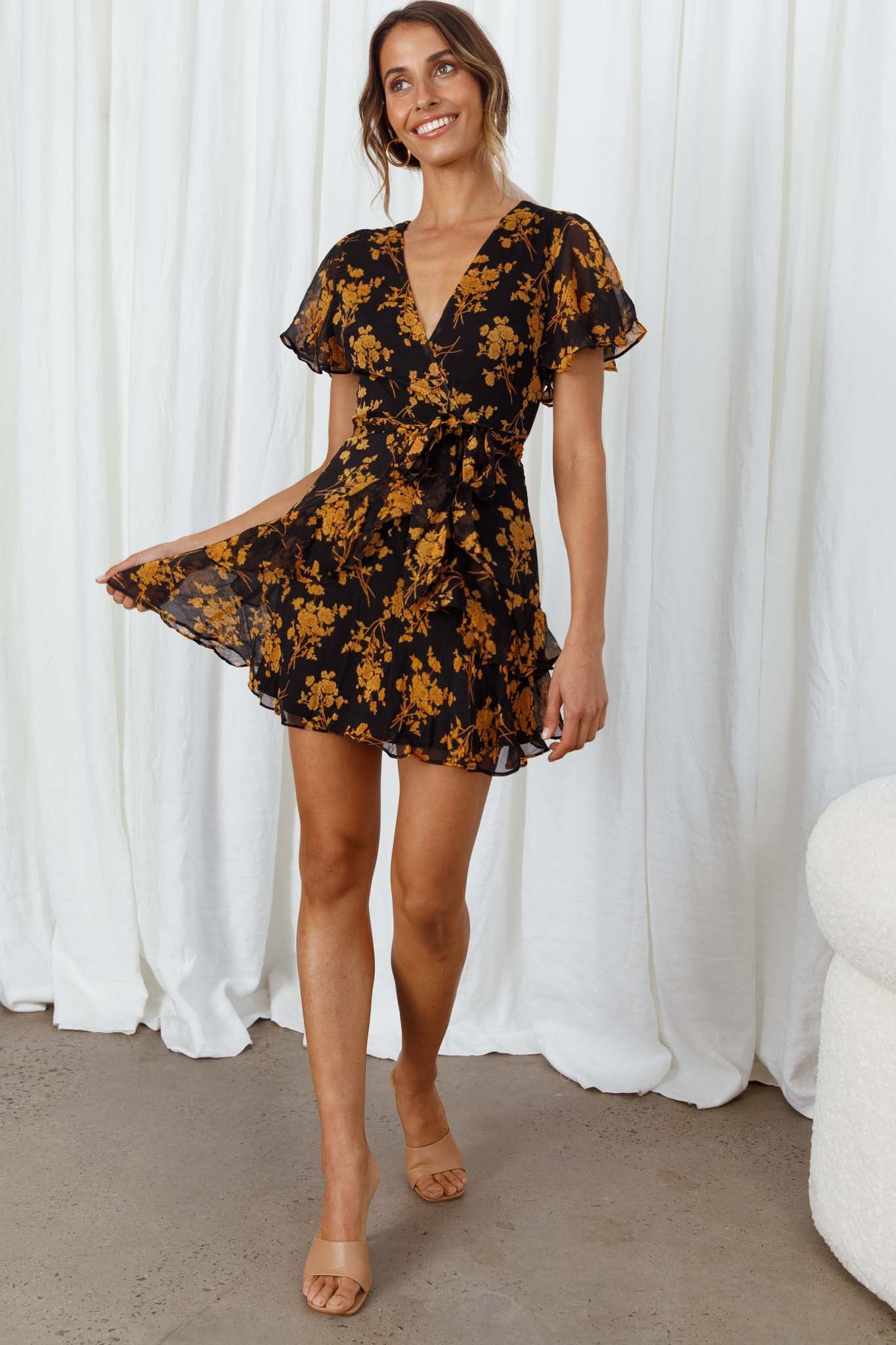 black dress with orange flowers SAY YOU NEED ME FLORAL MAXI IN COMBO AKIRA its an embodiment of softness Kerry Layered Angel Sleeve Dress