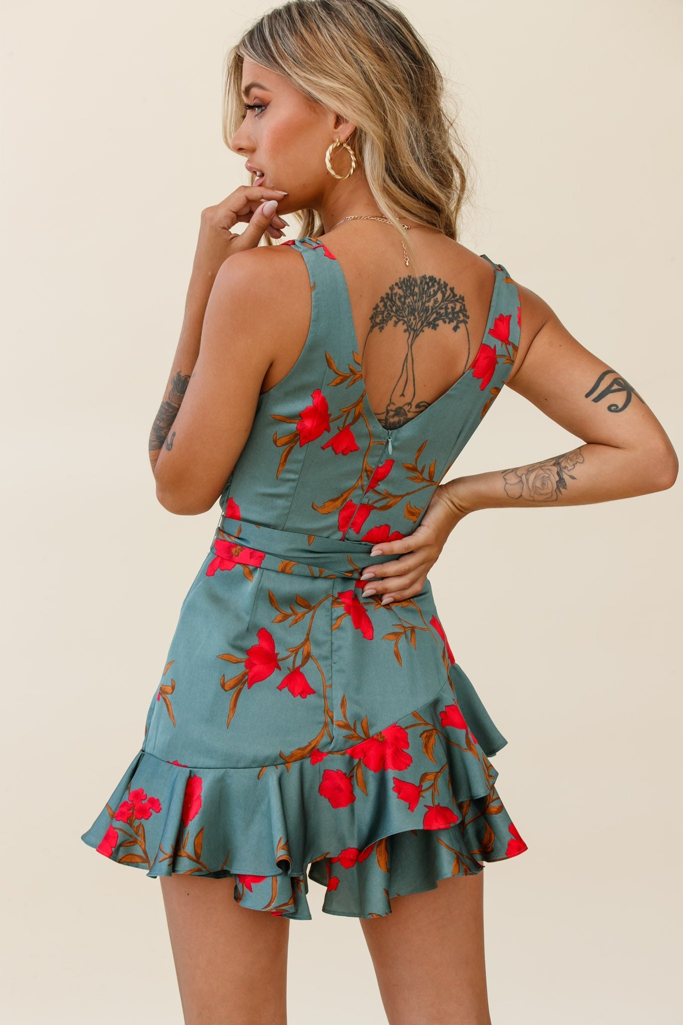 Wishful Thinking Plunging Neckline Ruffle Hem Romper White