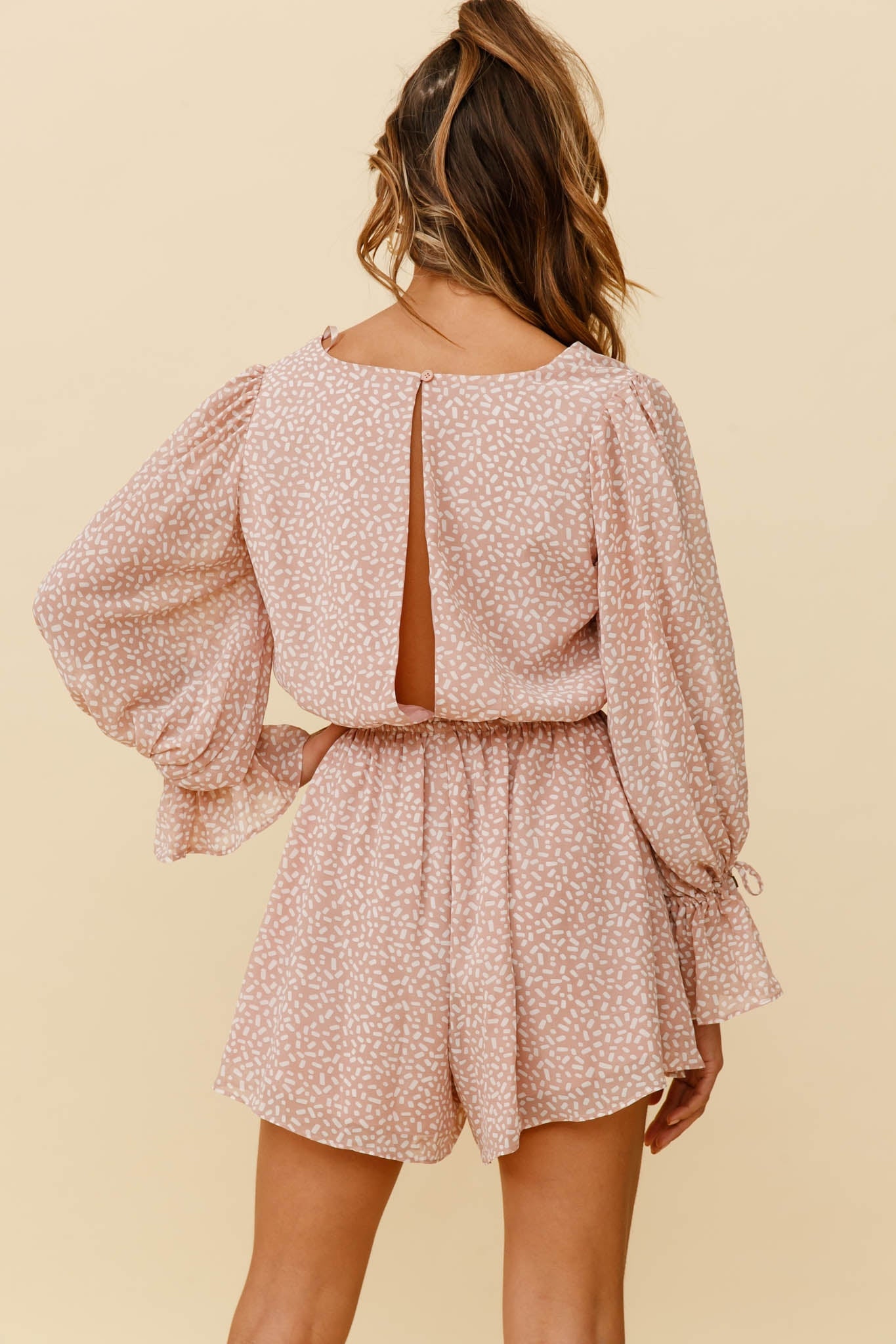 Believe It Or Not Long Sleeve Drawstring Romper Sprinkle Print Pink by Selfie Leslie