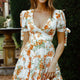 Jocelyn Short Sleeve Tied Cuff Layered Ruffle Dress Floral Print Orange Multi