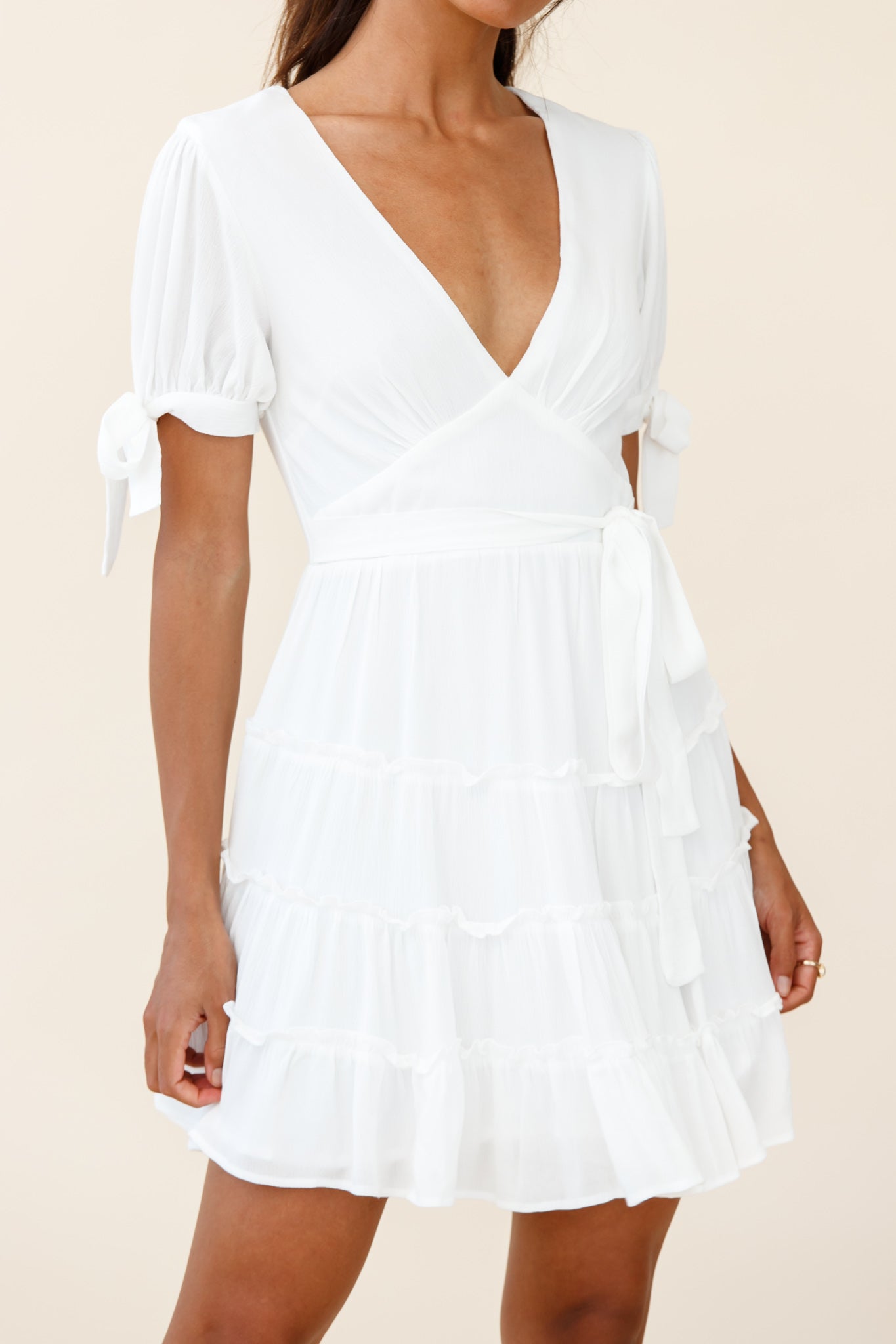 Shop the Jocelyn Short Sleeve Tied Cuff Layered Ruffle Dress White