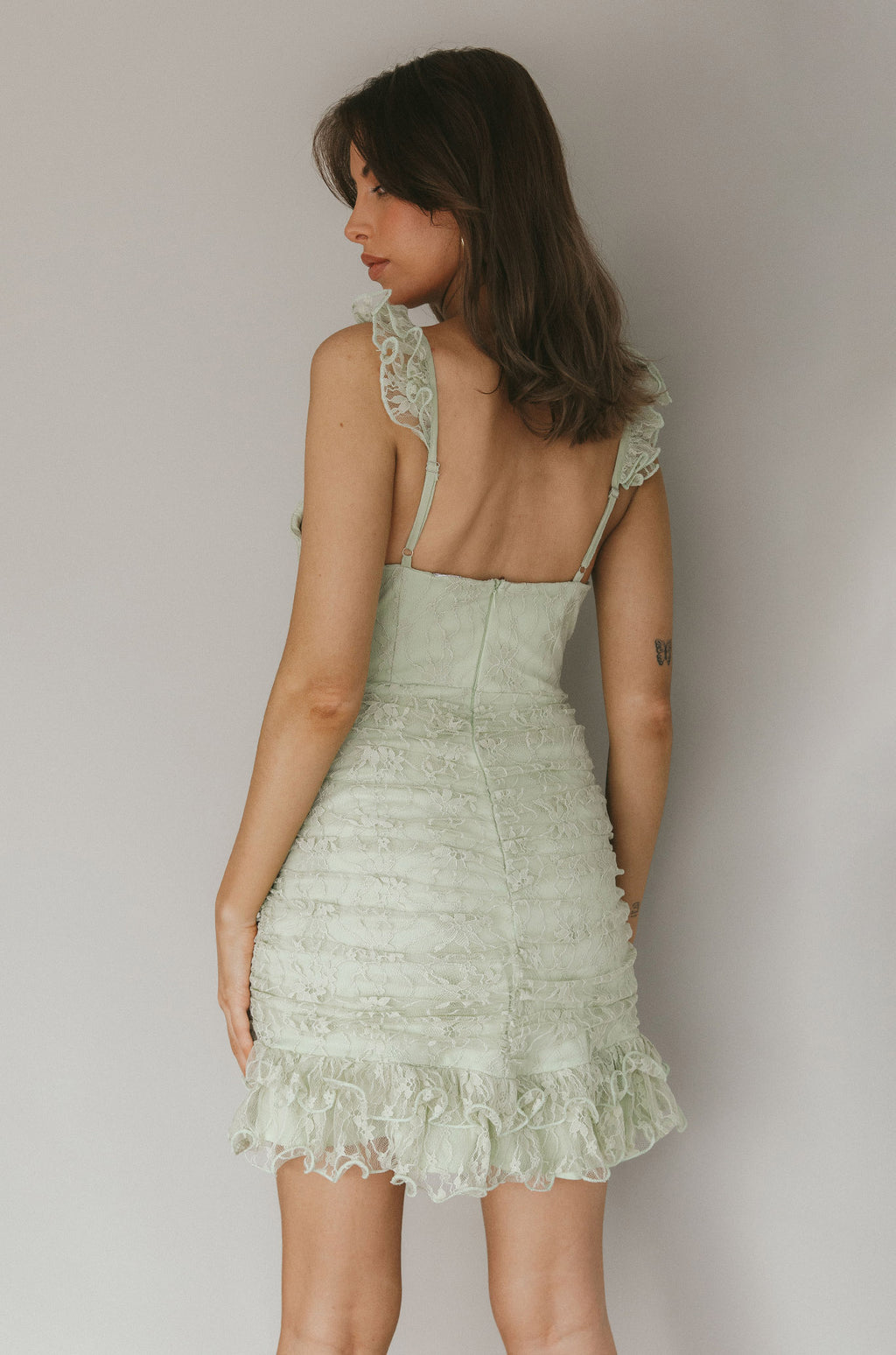 Kaley Ruched Side Layered Frill Hem Lace Mini Dress Sage by Selfie Leslie
