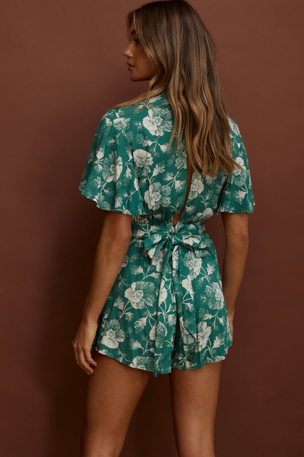 Unconditional Plunging Wrap Style Romper Floral Green by Selfie Leslie