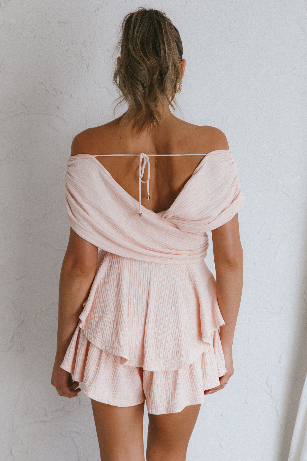 Glory Crossover Bust Layered Hem Romper Blush by Selfie Leslie