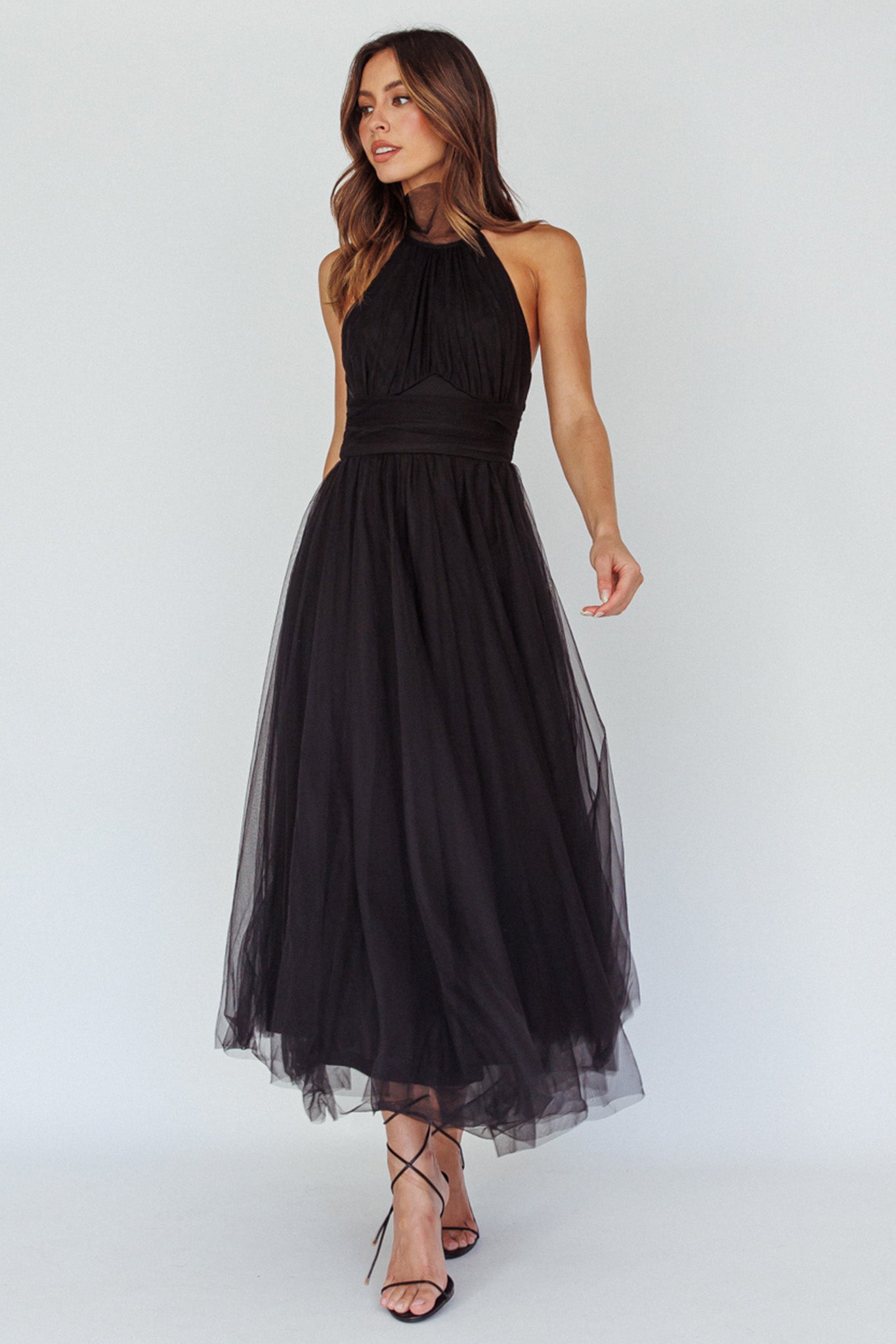 black midi tulle dress Mademoiselle – Petite Chérie The dress is decorated with ruffle sleeves Gaela Tulle Midi Dress in
