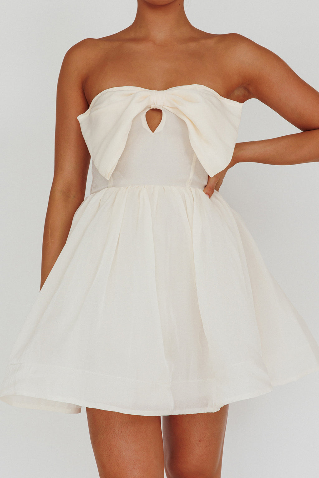 Arabesque Bow Bust Mini Dress Champagne by Selfie Leslie