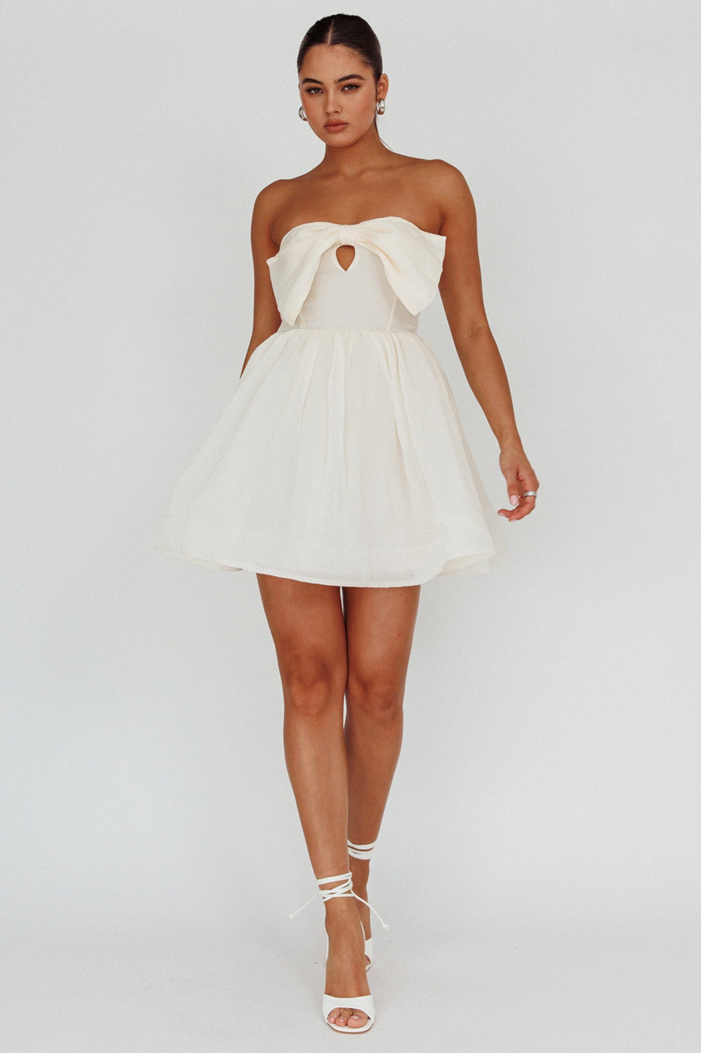 Arabesque Bow Bust Mini Dress Champagne by Selfie Leslie