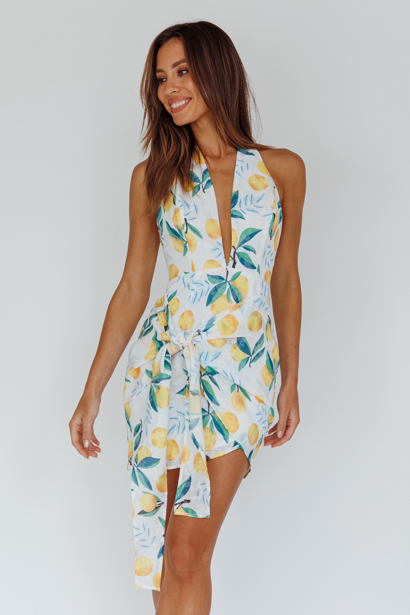 Euro Trip Halter Wrap Mini Dress Lemon by Selfie Leslie