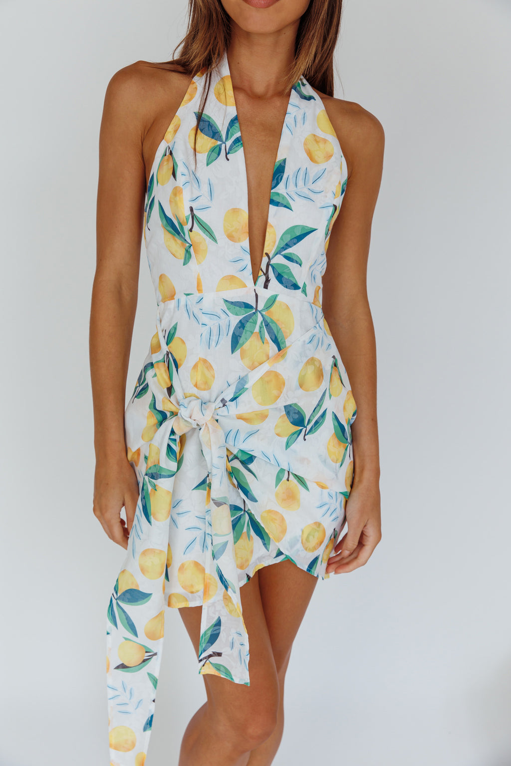 Euro Trip Halter Wrap Mini Dress Lemon by Selfie Leslie