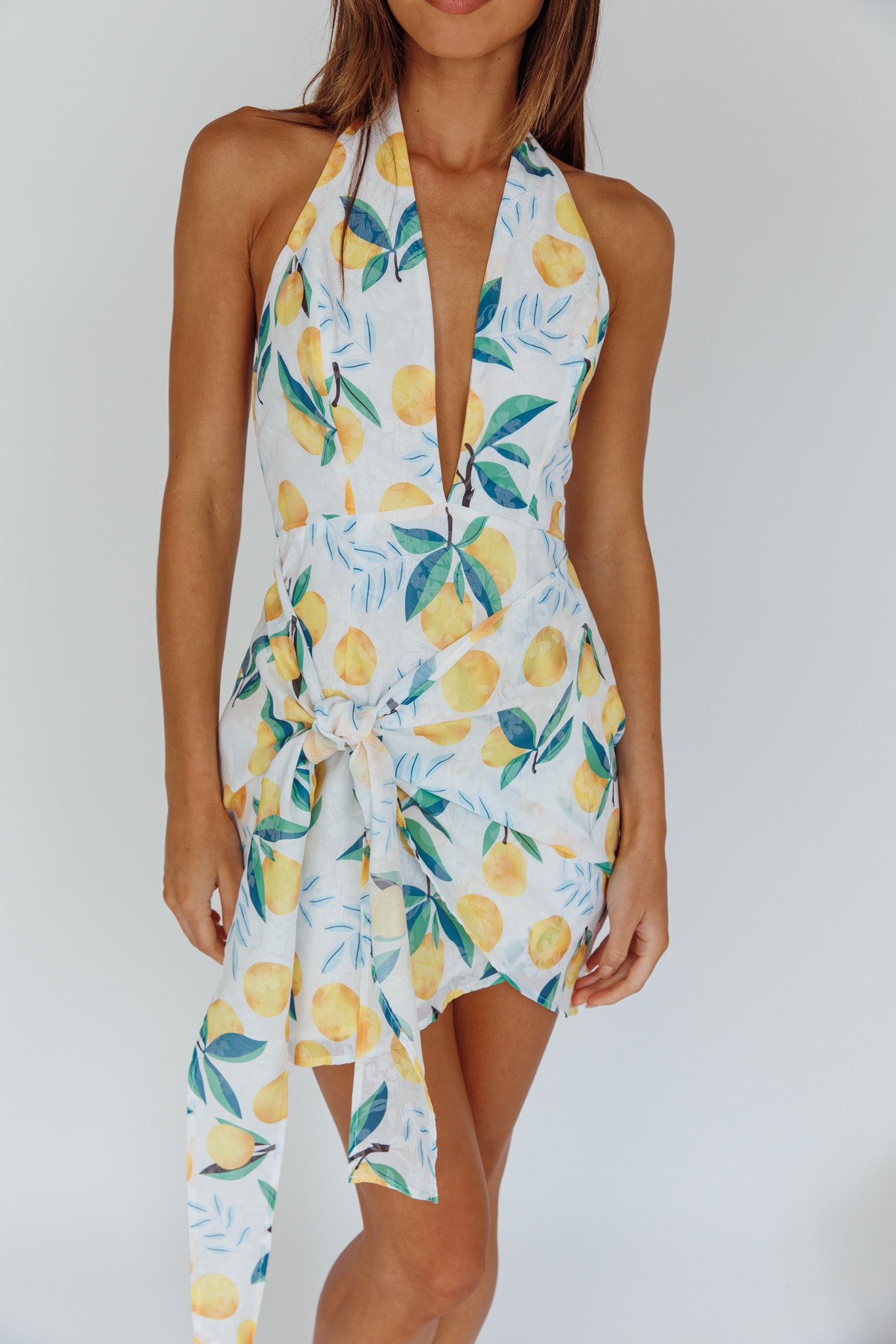Euro Trip Halter Wrap Mini Dress Lemon by Selfie Leslie