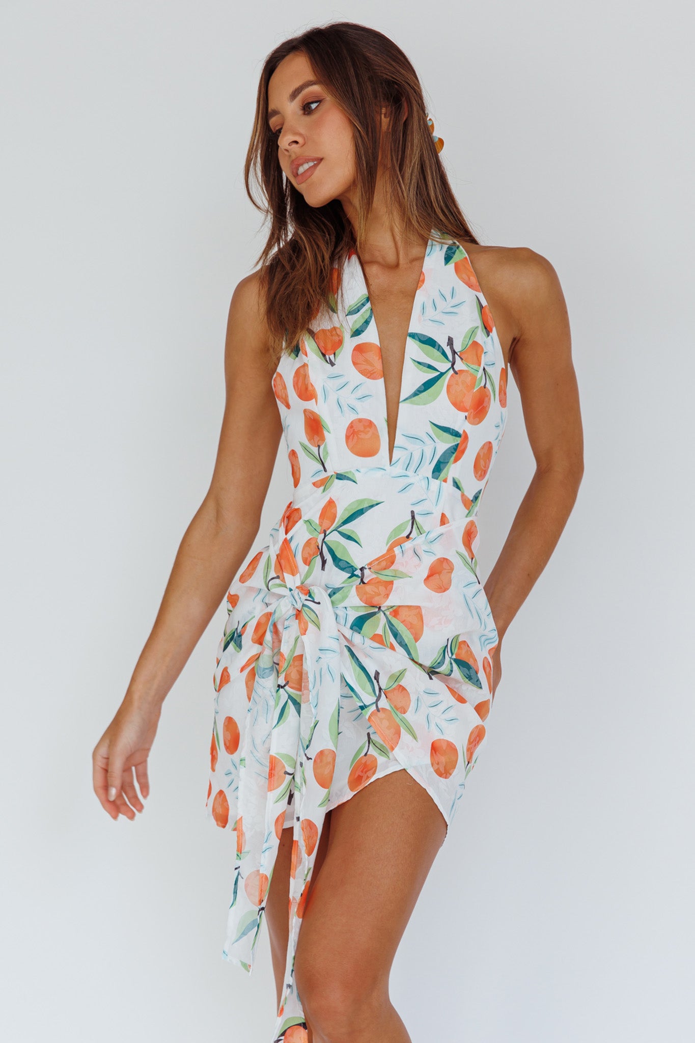 Shop the Euro Trip Halter Wrap Mini Dress Orange