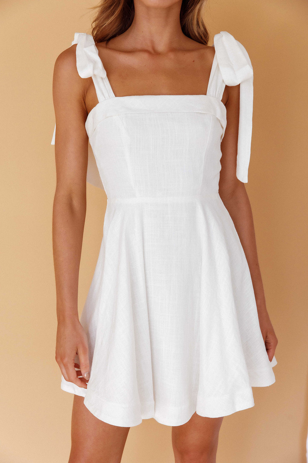 Jeanie Bow Shoulder Mini Dress Off White by Selfie Leslie