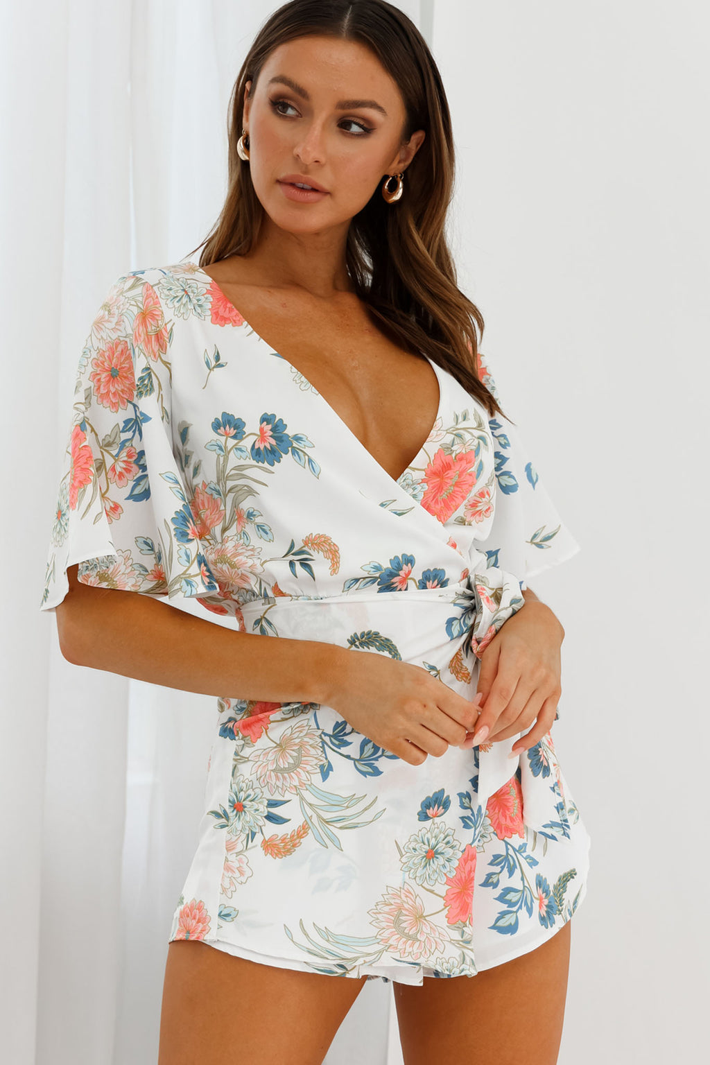 Nadi V-Neckline Wrap Romper Floral Print White by Selfie Leslie