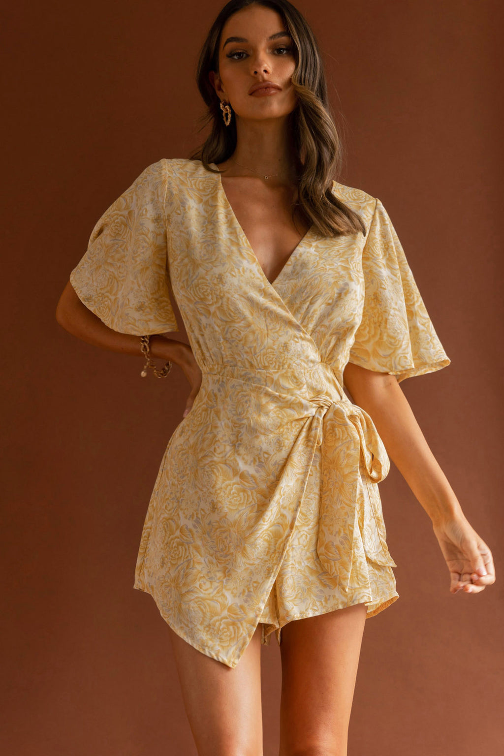 Nadi V-Neckline Wrap Romper Rose Flower Print Yellow by Selfie Leslie