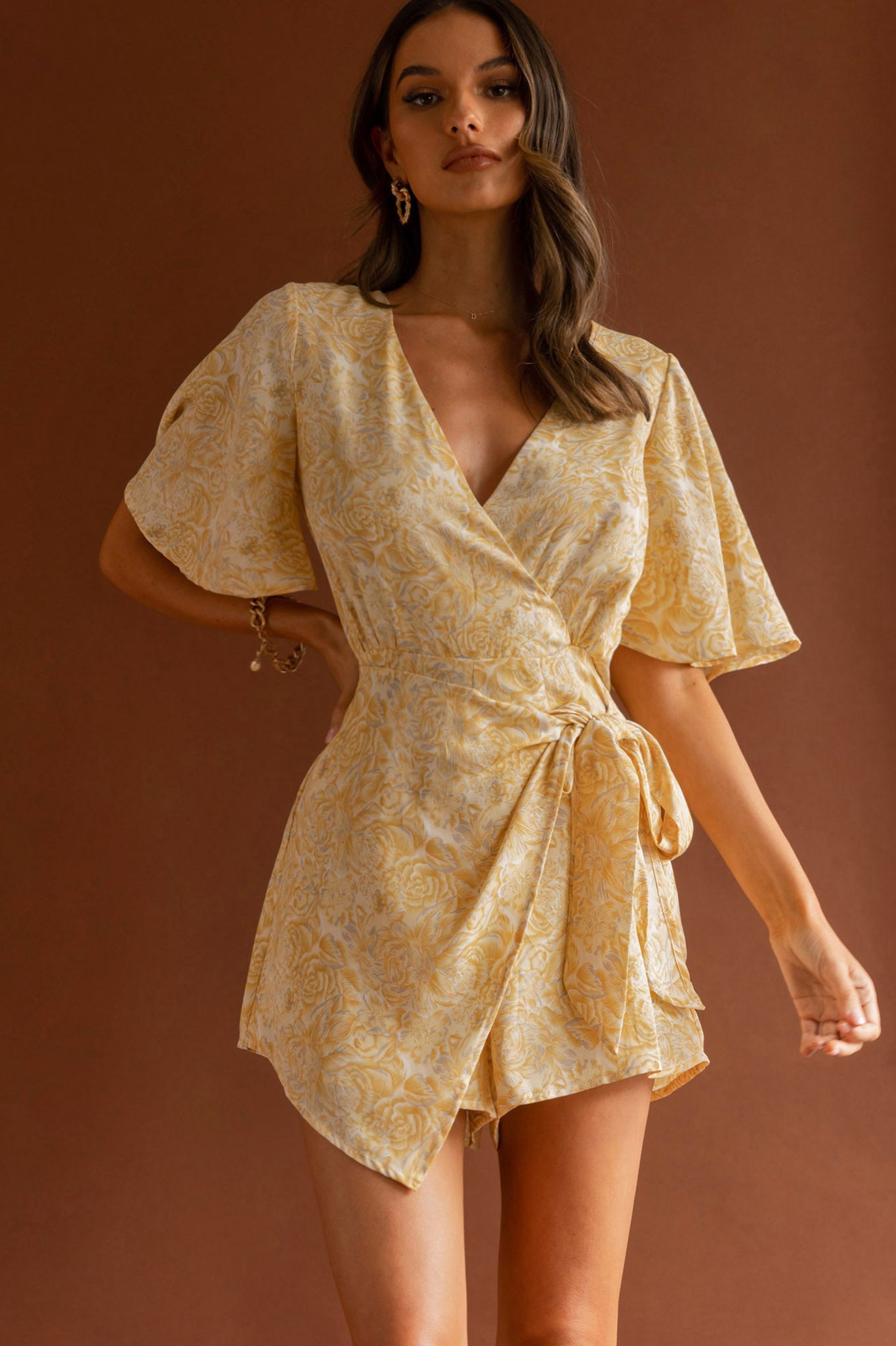 Nadi V-Neckline Wrap Romper Rose Flower Print Yellow by Selfie Leslie