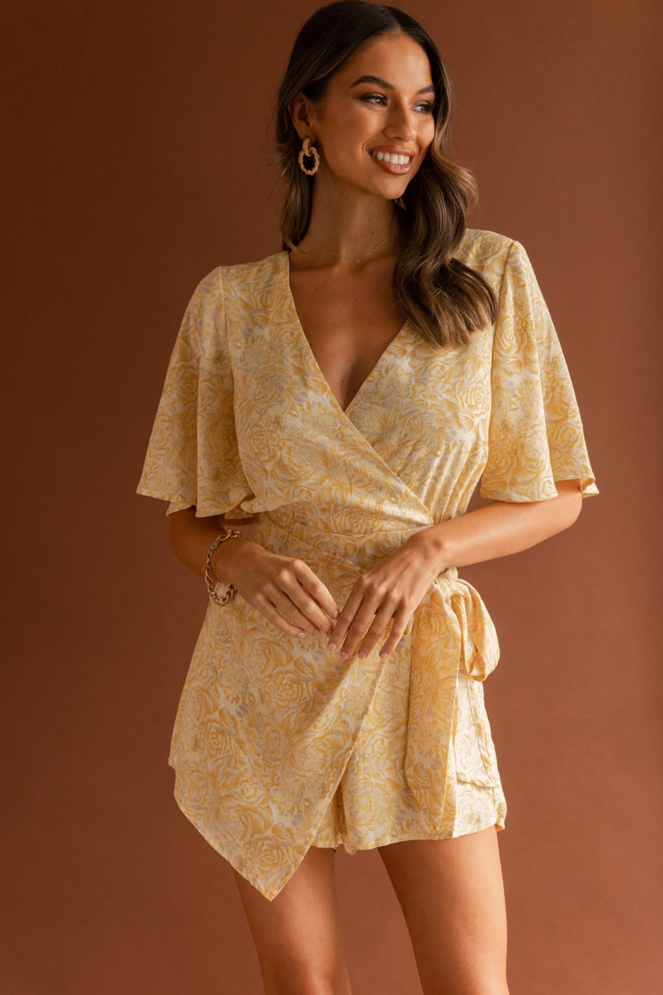 Nadi V-Neckline Wrap Romper Rose Flower Print Yellow by Selfie Leslie