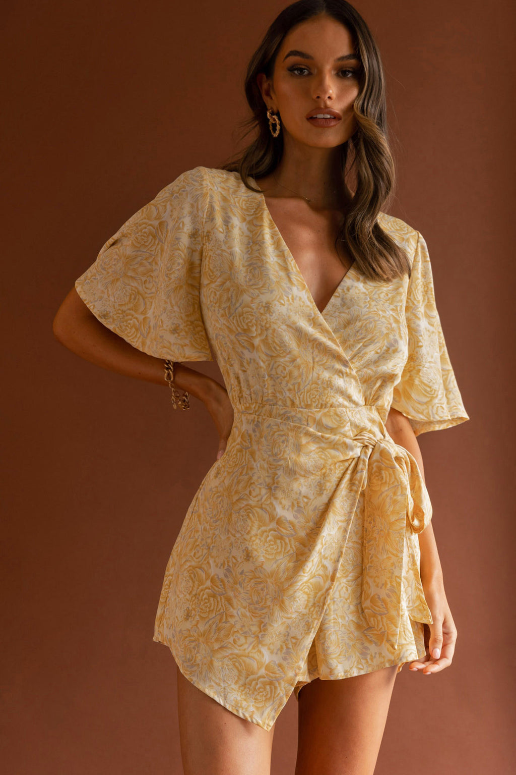 Nadi V-Neckline Wrap Romper Rose Flower Print Yellow by Selfie Leslie