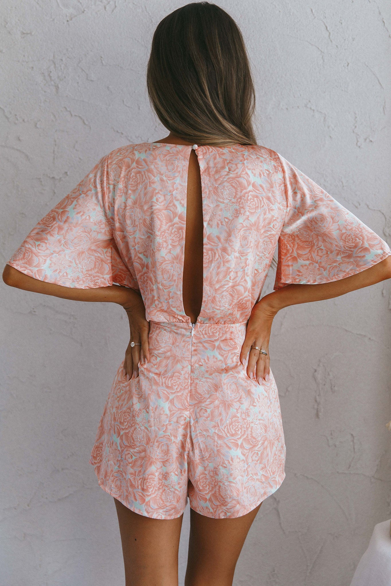 Nadi V-Neckline Wrap Romper Flower Paint Print Pink by Selfie Leslie