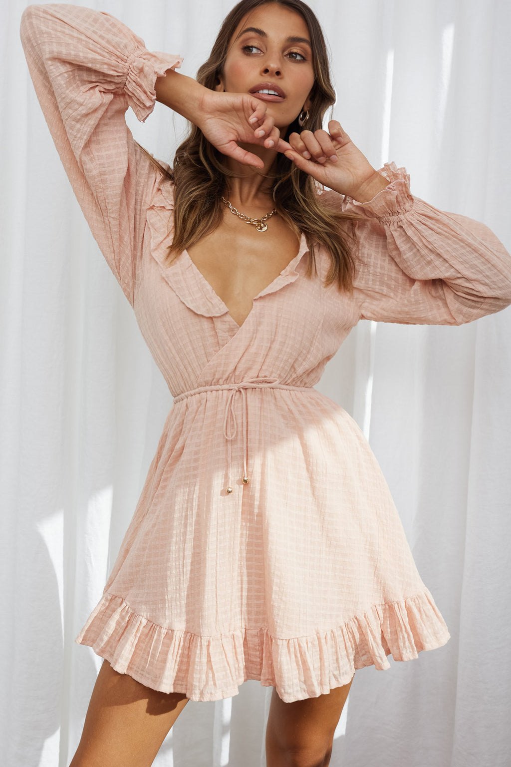 Hooked On A Feeling Long Sleeve String Tie Back Mini Dress Peach by Selfie Leslie