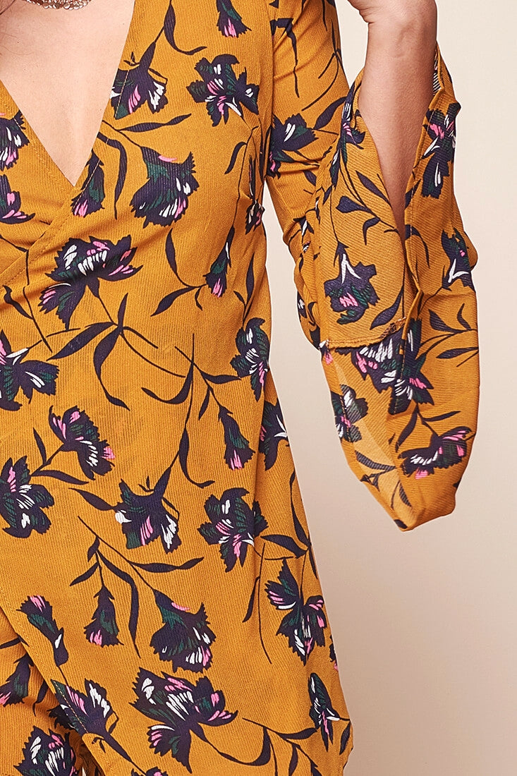 Grace Bell Sleeve Asymmetrical Wrap Booty Romper Mustard by Selfie Leslie