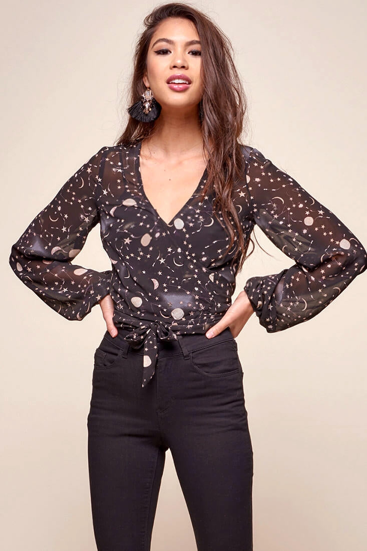 Celeste Galaxy Star Print Wrap Top Black by Selfie Leslie