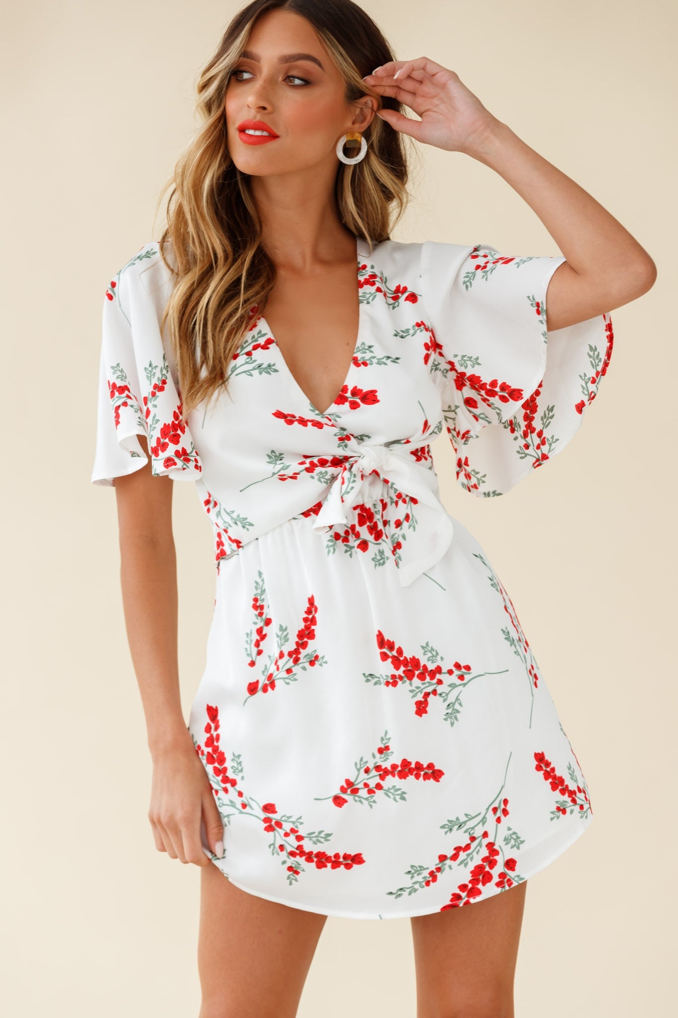Stealing Hearts Flutter Sleeve Wrap Front Dress Floral Print White by Selfie Leslie