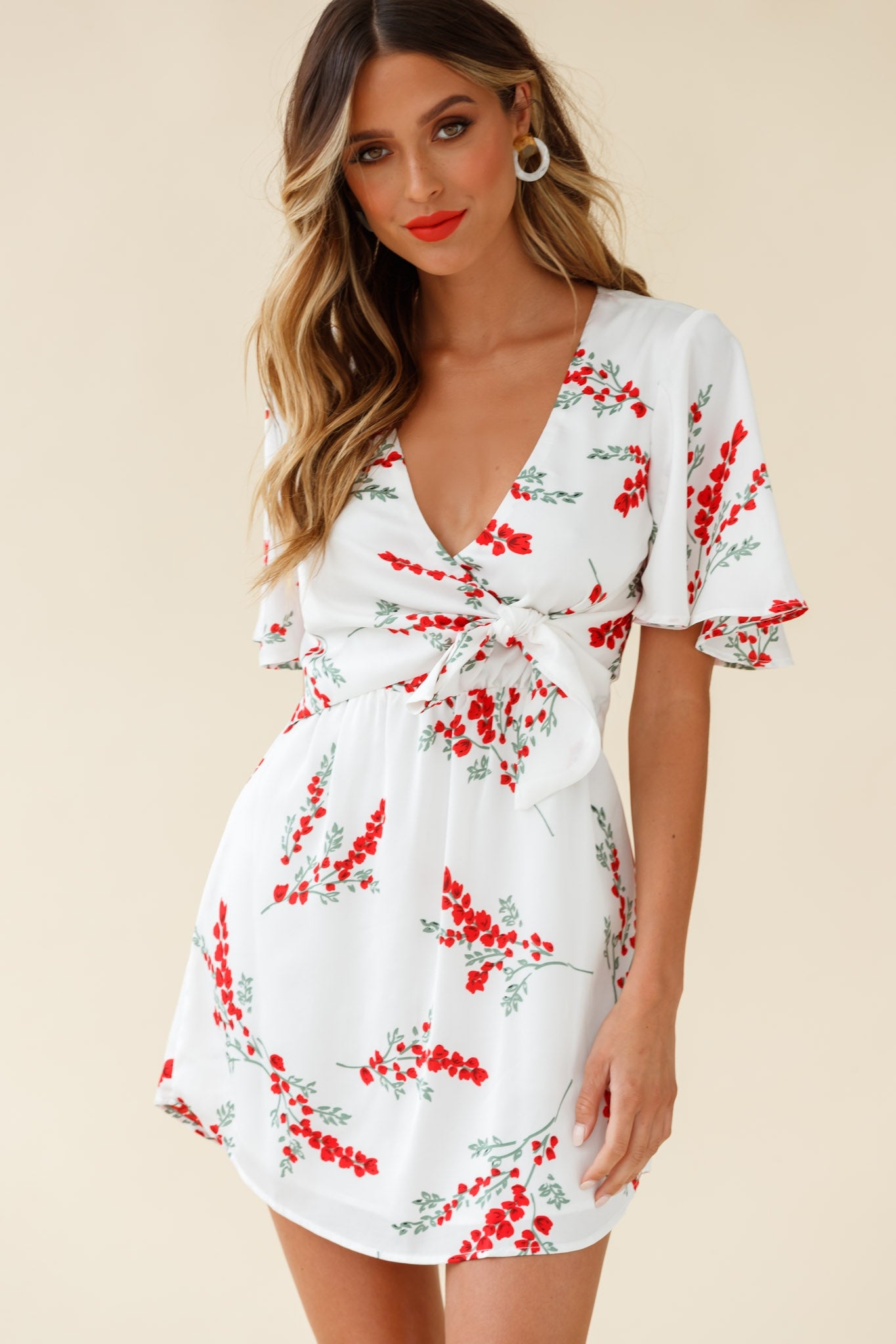 Stealing Hearts Flutter Sleeve Wrap Front Dress Floral Print White by Selfie Leslie